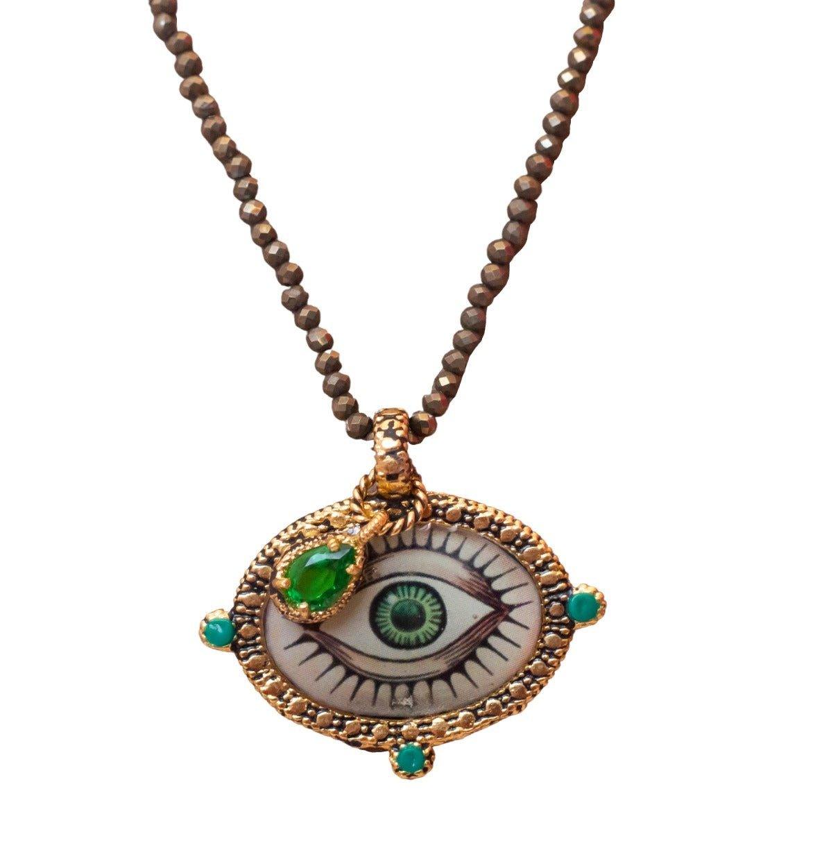 Collar medalla ojo Cadenas y Collares de Joyería de autor Regina Castillo